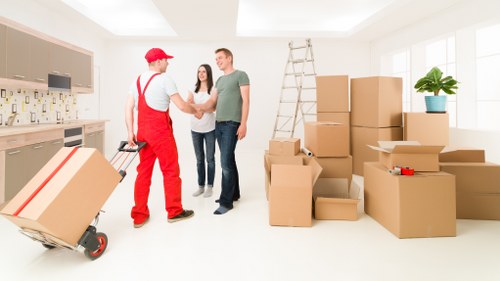 Boxes and furniture being prepared for a small move