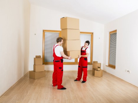 Packing boxes and furniture ready for transport in Catford