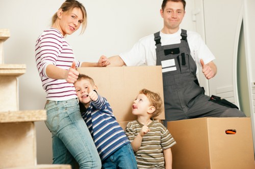 Furniture and boxes being loaded for a Catford moving job